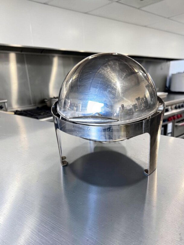 Unbranded stainless steel roll-top chafing dish with removable round pan, elevated stand, premium condition.