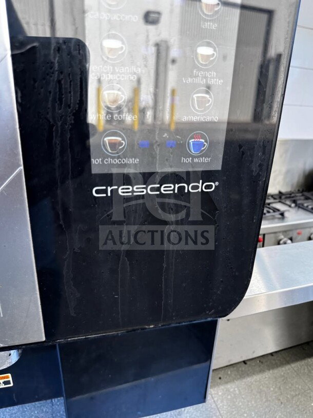 Bunn-O-Matic Crescendo 44300.0213 espresso machine, 9 drink options, black finish, outstanding condition, fully operational.