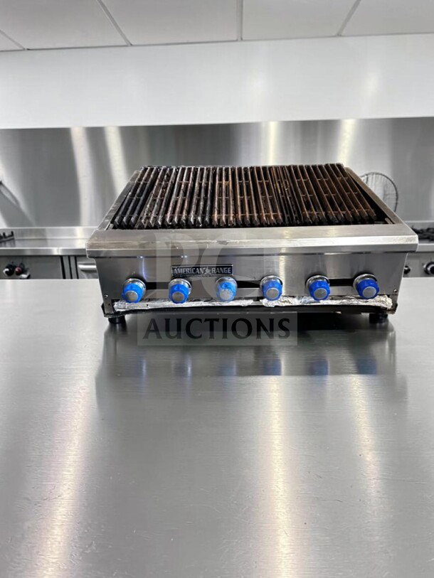American Range 48" Radiant Gas Charbroiler, six burners, cast-iron grates, stainless steel, fully operational condition.