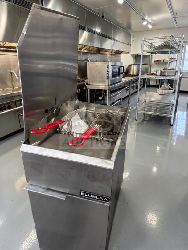 Blue Lava BLF3-NG natural gas floor fryer, 40 lb. capacity, 90,000 BTU, three tube burners, CSA certified, excellent condition.