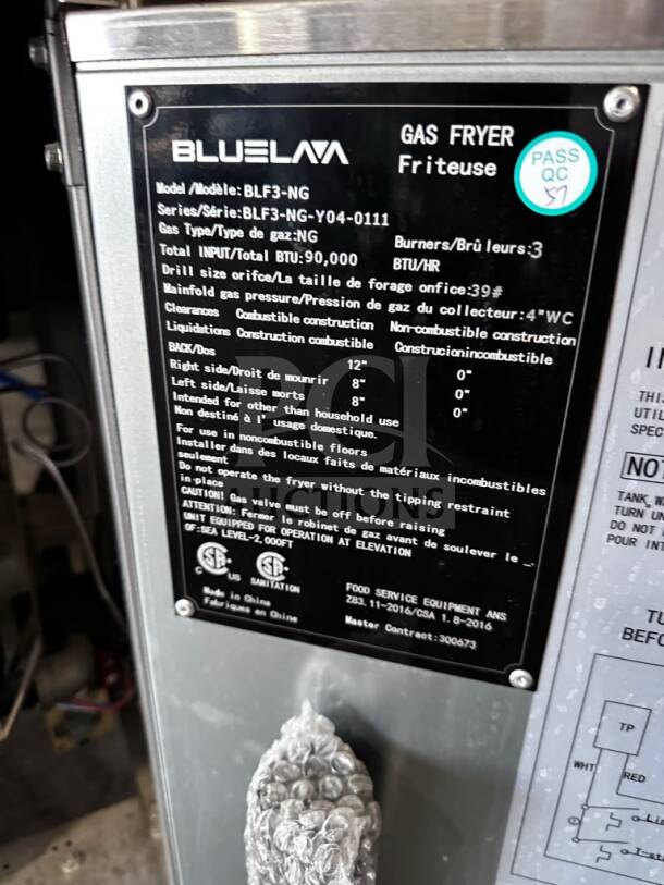 Blue Lava BLF3-NG Gas Fryer, 40 lb. capacity, 90,000 BTU, three tube burners, CSA certified, with detailed specification label.