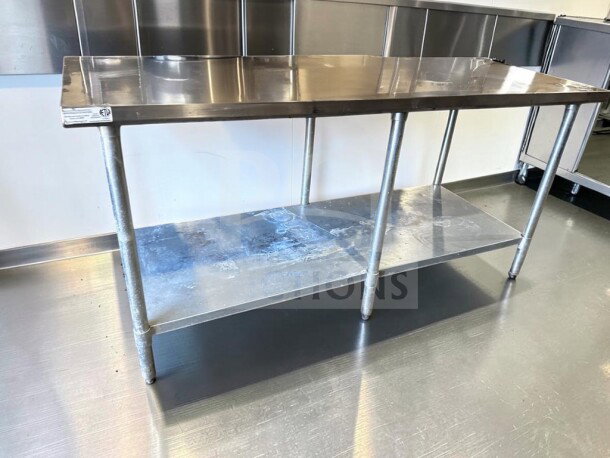 Atlanta Culinary 72" stainless steel work table, adjustable undershelf, galvanized legs, ETL/NSF certified, inspected.