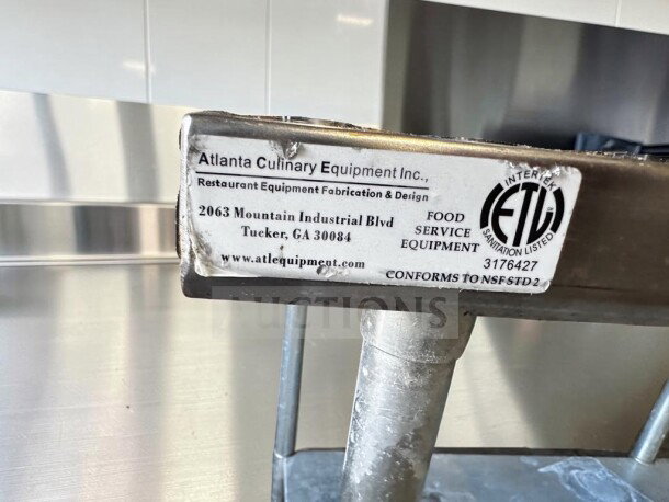 Atlanta Culinary 72" stainless steel work table, adjustable undershelf, galvanized legs, ETL/NSF compliant, inspected.