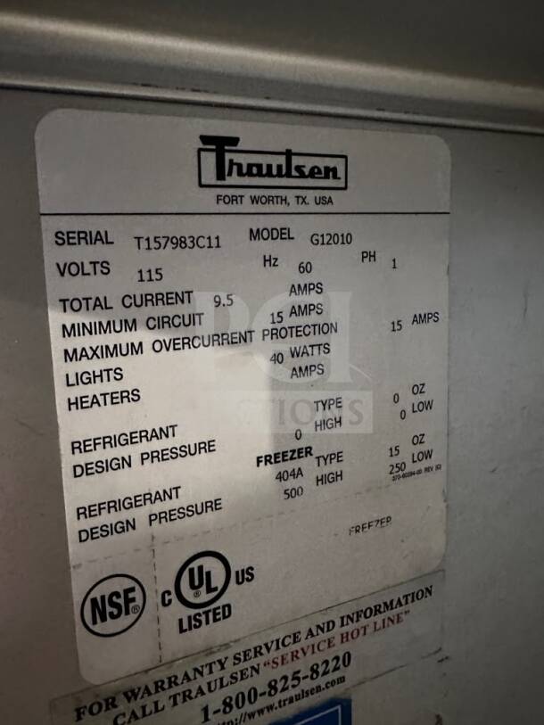 Label for Traulsen G12010 reach-in freezer with serial T157983C11. Features 115 volts, NSF and UL listed. In flawless condition.