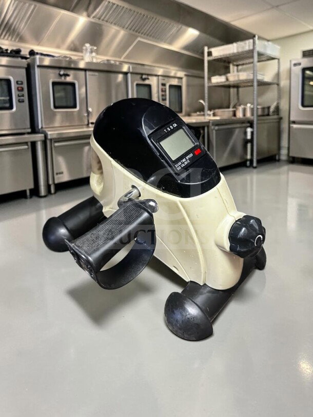 YOSUDA YBM-1 portable mini exercise bike with LCD monitor, adjustable resistance, and pedals. Tested, excellent condition.