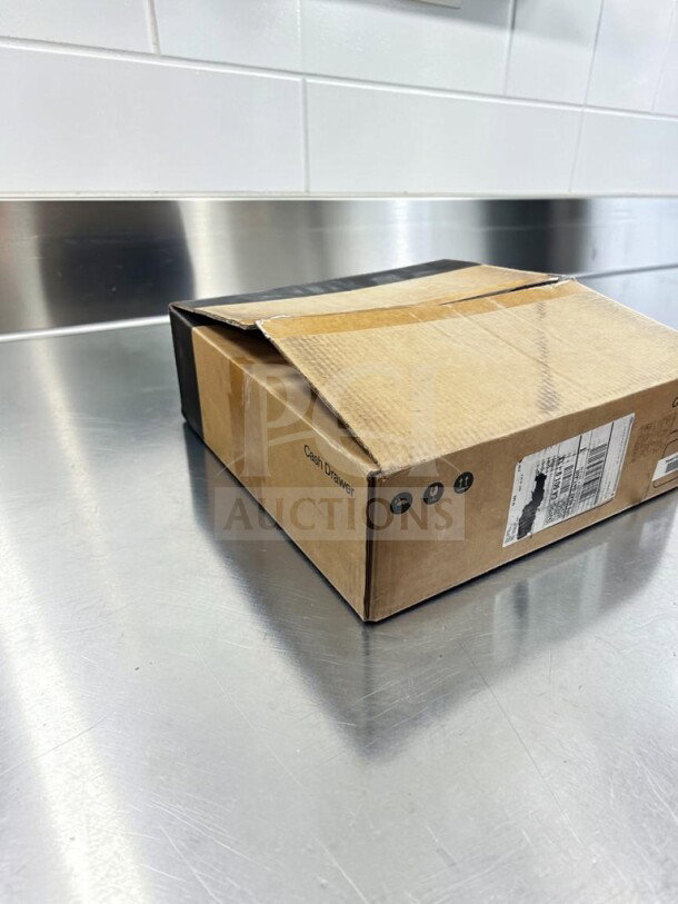 New Toast TC200 commercial black POS cash drawer in open box, lockable with key, removable cash till, printer-driven.