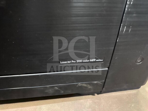 HP LaserJet Pro 200 Color MFP M276nw printer, well-maintained, model label visible, in fully operational condition.
