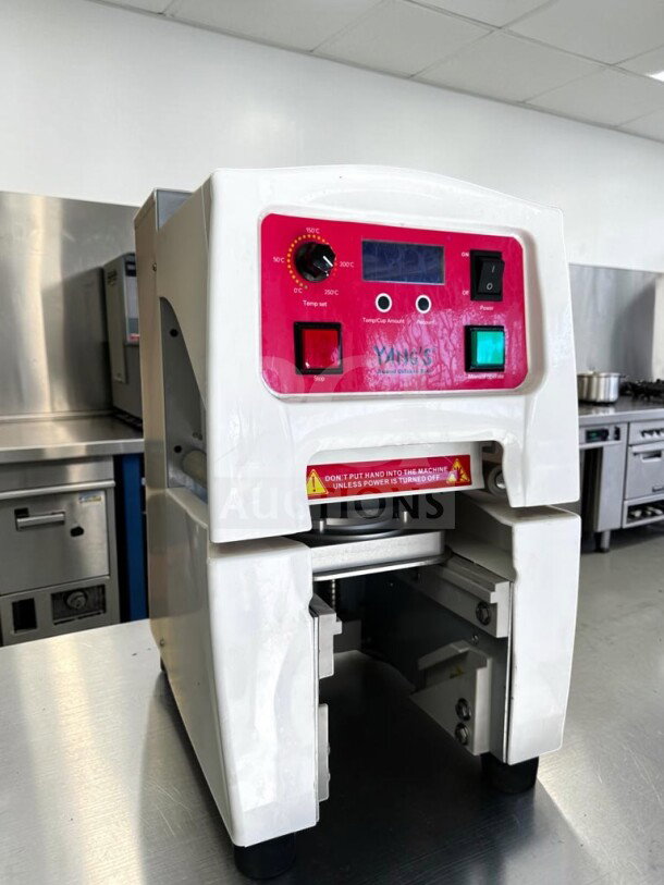 High-grade Y-Fang Commercial Cup Sealing Machine, adjustable temperature, CE marked, model YFA-S-SEA-129, fully operational.