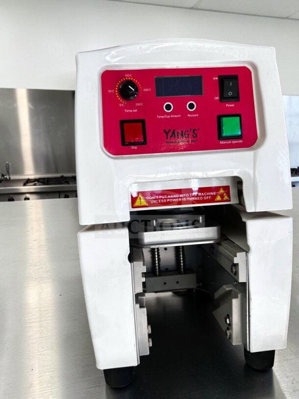 High-grade Y-Fang commercial cup sealing machine, adjustable temperature, countertop model, CE marked, fully operational.