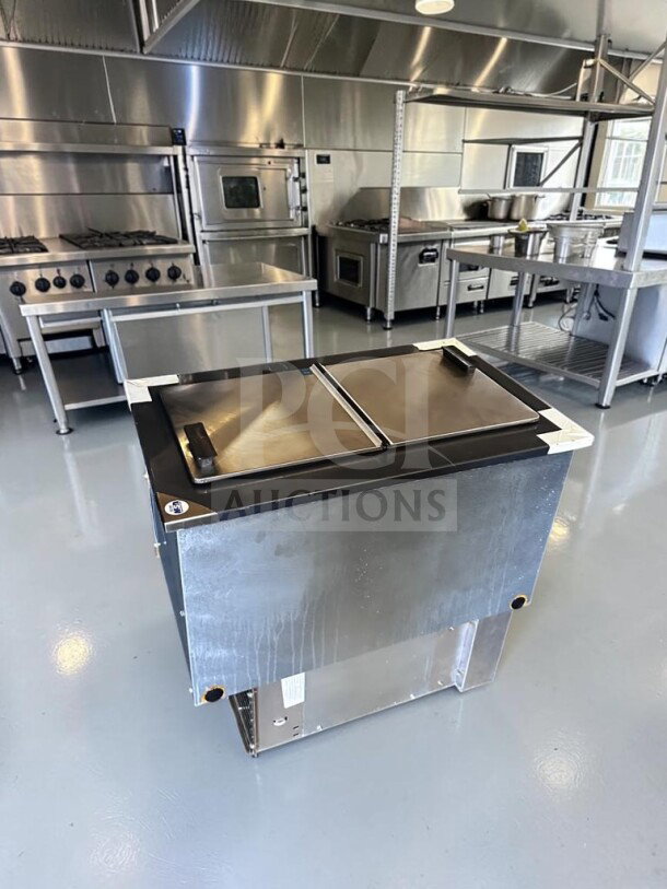 Pristine Delfield N225P 6-Gallon Ice Cream Dipping Freezer, dual stainless steel lids, 115V, NSF & UL listed, new condition.