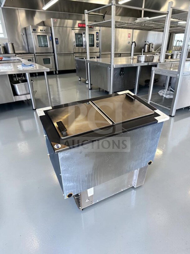 Pristine Delfield N225P 6-Gallon Drop-In Ice Cream Dipping Freezer in stainless steel, dual folding lids, NSF & UL listed.