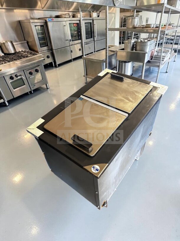 Pristine Delfield N225P 6-gallon ice cream dipping freezer with dual stainless folding lids, self-contained, NSF & UL listed.