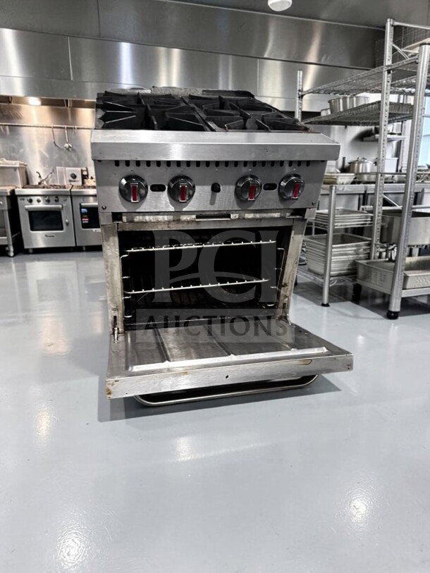 Kintera KR4 commercial gas range with four 30,000 BTU burners, standard oven. Fully tested, dependable condition.