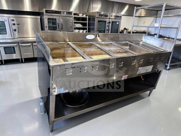 Optimal Condition Duke 305 Aerohot Hot Food Table with five wells, stainless steel base, 12,500 BTU, fully operational.