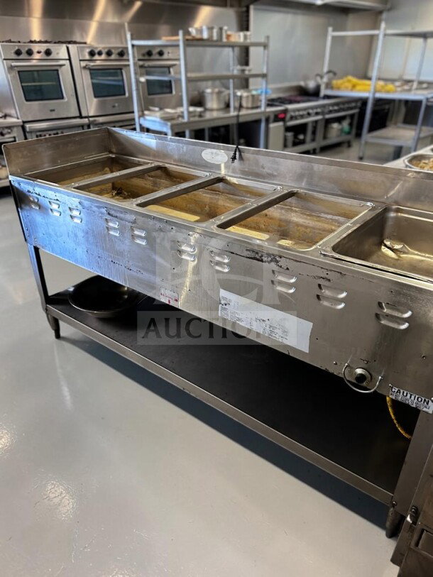 Duke 305 Aerohot commercial gas hot food table, 72-3/8" with five wells, stainless steel, open base, operational condition.