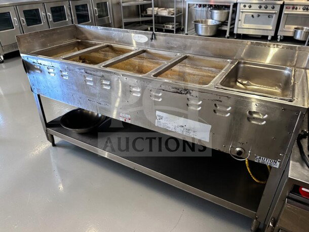 Duke 305 Aerohot 72-3/8" commercial hot food table, five wells, stainless steel, open base, operational, 12,500 BTU.