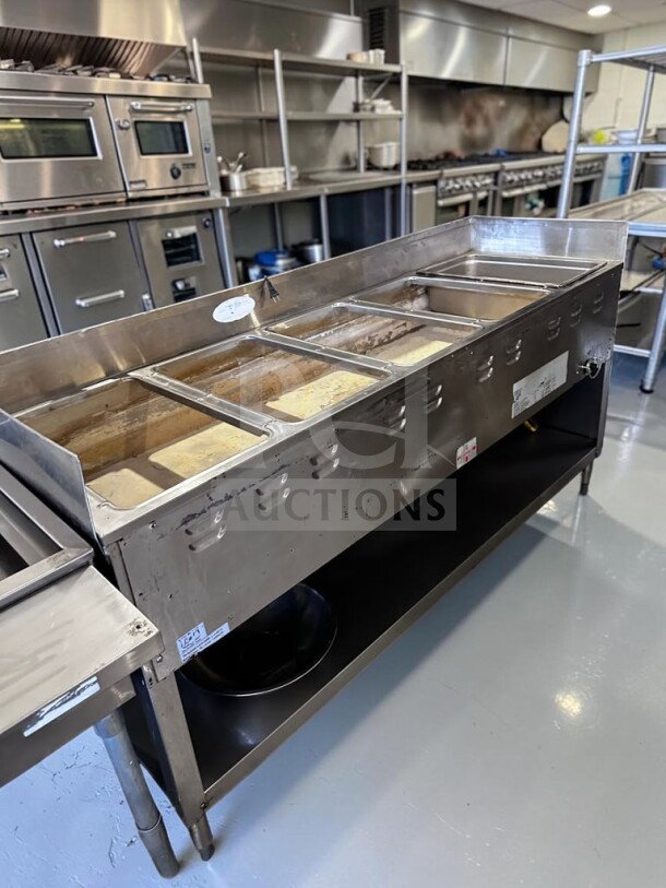 Duke 305 Aerohot commercial hot food table with five wells, stainless steel base, undershelf, 12,500 BTU, fully operational.