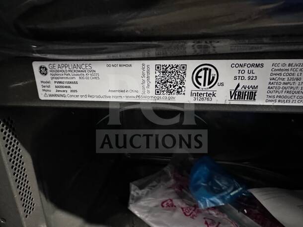 GE Profile Microwave Model PVM9215SK6SS label; new, manufactured Jan 2025, 2.1 cu. ft., stainless steel, 1,000W, 400 CFM.