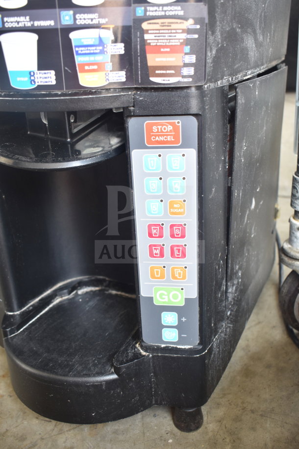 Taylor SB24-12 commercial frozen beverage machine, countertop model, used condition, 115 volts, visible control panel and options.