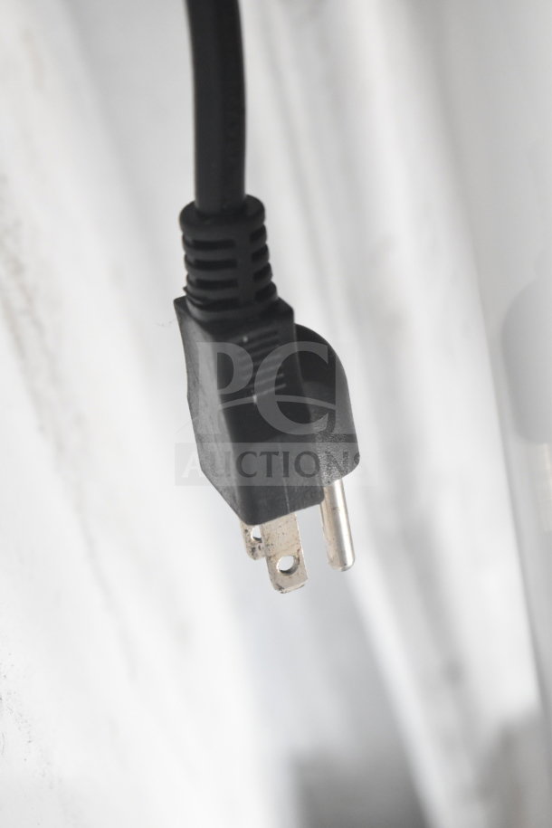 Close-up of a power plug for the Vevor SKT1 Commercial Electric Steam Table, 120V, 1 Phase.
