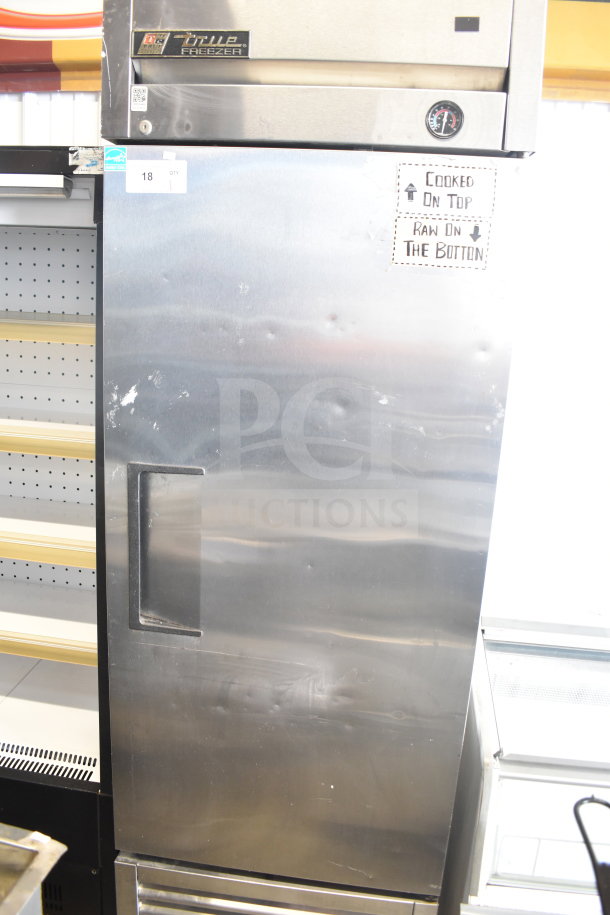 True T-23F commercial single door reach-in freezer, stainless steel, on casters, visible dents, 115V, 1 phase.