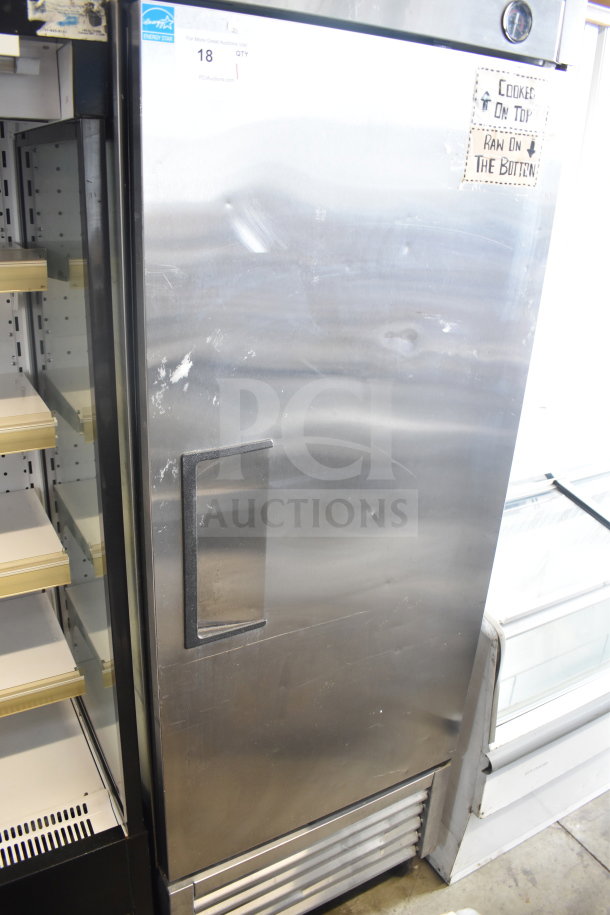True T-23F commercial freezer, single door, stainless steel, on casters, 115 volts, visible signs of wear.