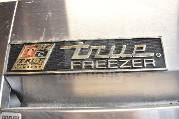 True T-23F Commercial Freezer label; stainless steel, features "True Manufacturing Company" and "True Freezer" markings.