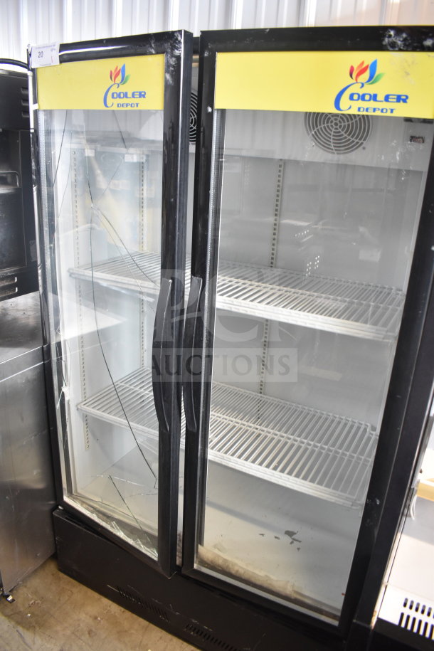 Cooler Depot 2-door reach-in merchandiser on casters, visible cracked glass, shelves intact, branded label on top.