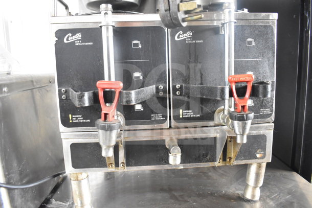 Curtis GEM-12-10 commercial coffee machine with dual servers, brew baskets, and hot water dispenser, 220V, 1 phase.