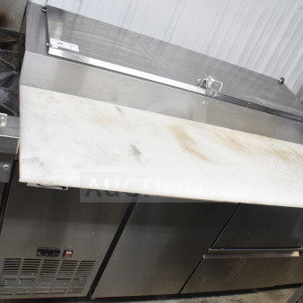 Avantco commercial pizza prep table with 2 drawers, 1 door, on casters. Features stainless steel, 115V, 1 phase. Used condition.