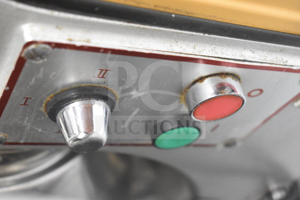 Anvil MIX7120 mixer control panel with speed settings I and II, green and red buttons, visible wear.