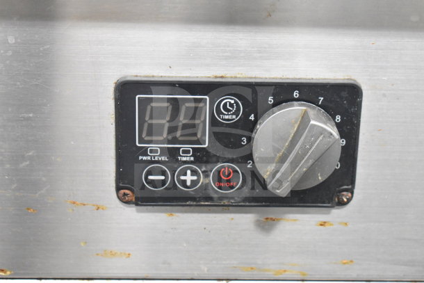 T&P PSL-80-RA2 induction wok range control panel with digital display, timer, power level settings, and on/off button.