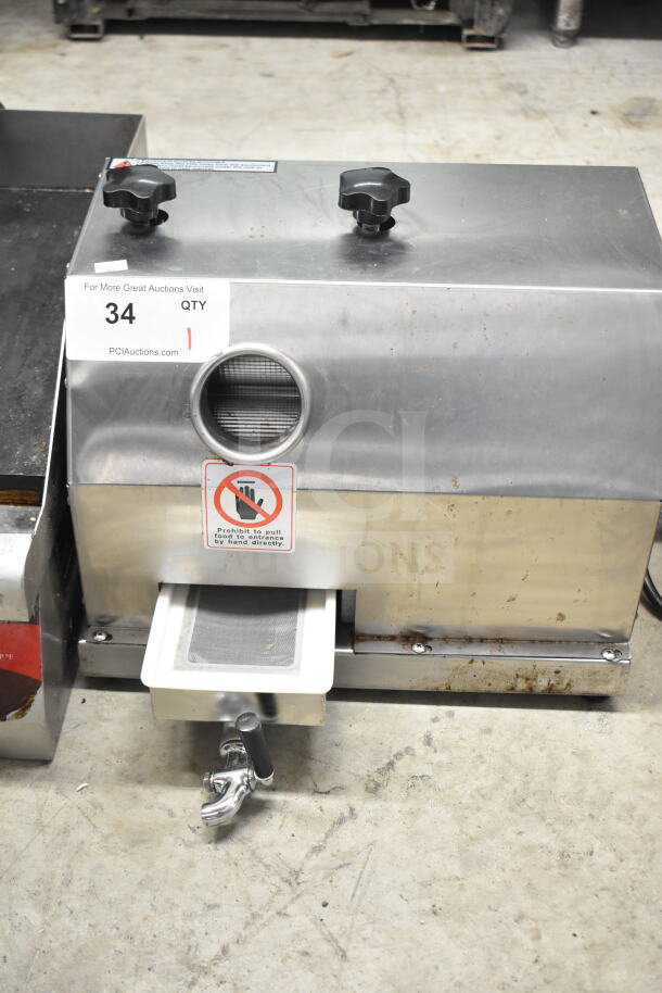 YF-SY80 Manual Sugar Cane Juice Extractor, stainless steel, durable, with filter tray and valve, moderate wear visible.