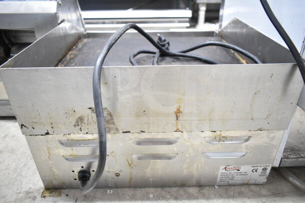 Avantco 177EG16N electric griddle, 120V, used condition with surface wear. Model and voltage details visible on label.
