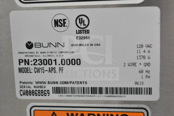 Label on 2018 Bunn CW15-APS Commercial Coffee Machine showing NSF, UL certifications, model, and serial number CW00068869.