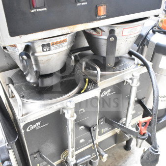 Curtis GEM-12-10 commercial coffee machine with two servers and brew baskets. Features control panel; 220V, 1 phase.
