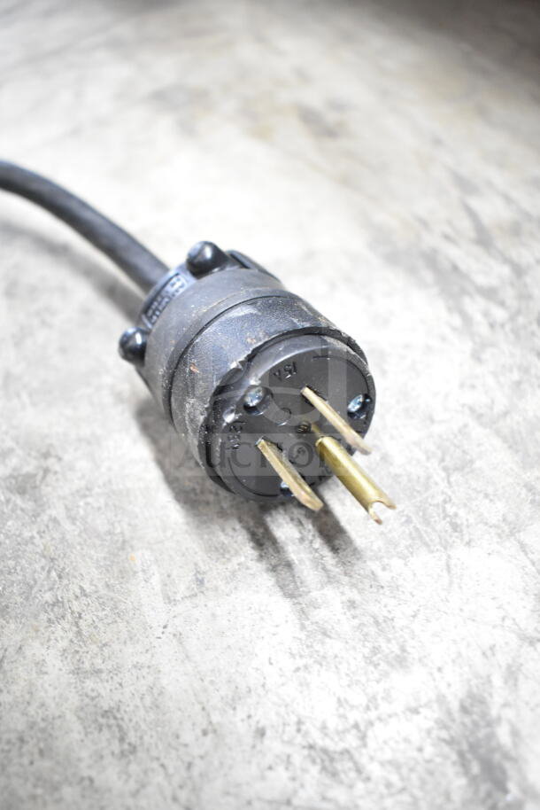 Black industrial power plug for Elmeco FC2 commercial slushie machine. Three-prong, 115 volts, 1 phase.