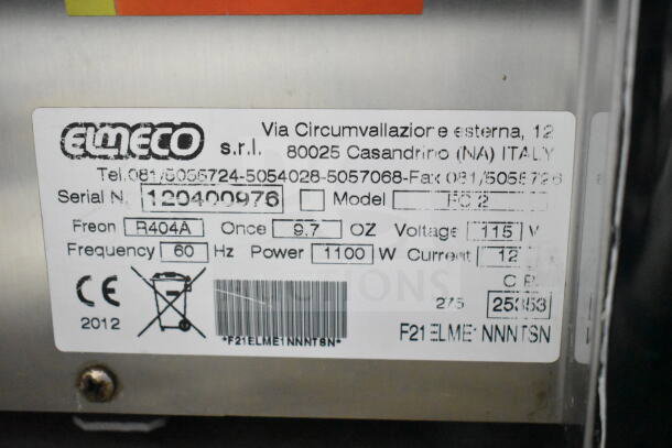 Elmeco FC2 slushie machine label, showing model, serial number 120400976, voltage 115V, power 1100W, and CE mark.