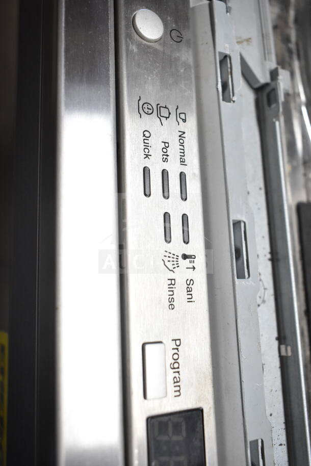 Miele undercounter dishwasher control panel showing settings for normal, pots, quick wash, rinse, and sanitize.