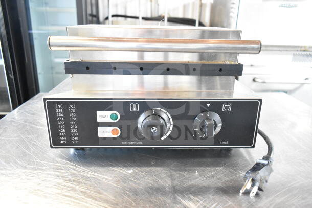 FY-119 countertop 6 stick waffle maker, 110V, 1 phase. Features temperature control, power, and heating indicators. Good condition.