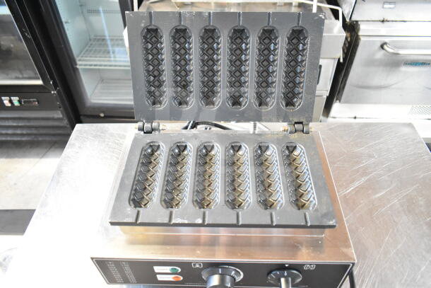 FY-119 6-stick waffle maker, open view. Uses 110 volts, 1 phase. Black non-stick plates, control knobs visible.