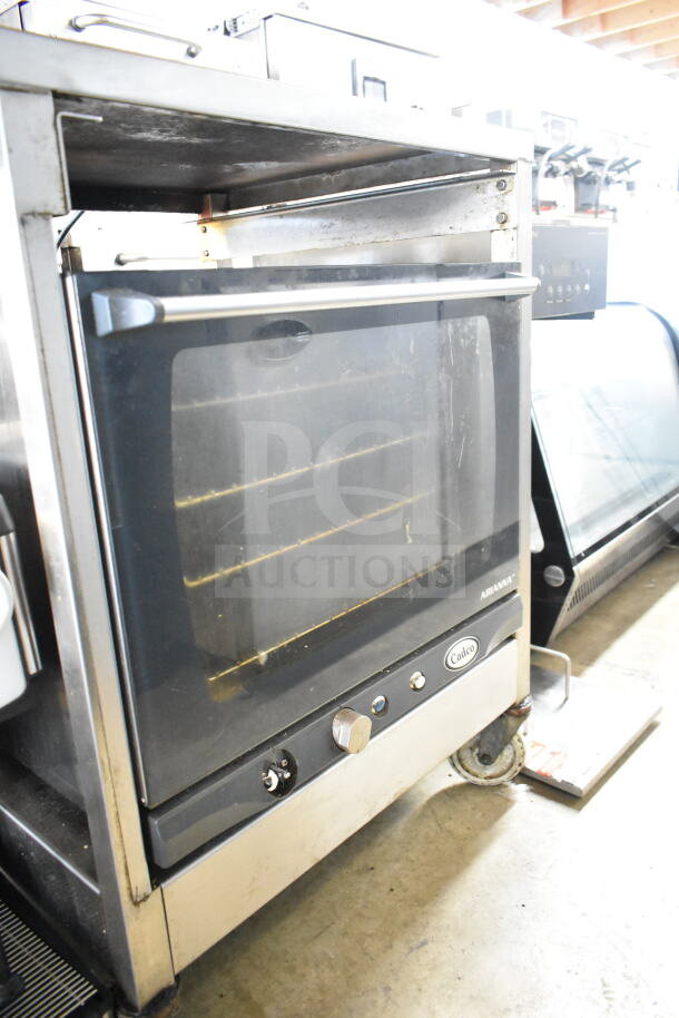 2021 Cadco XAFT133 Arianna countertop convection oven on casters, 208-240V, stainless steel, visible control panel.