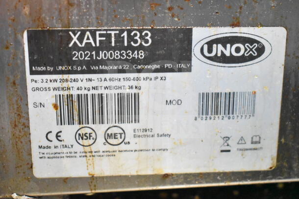 2021 Cadco XAFT133 Arianna countertop convection oven label showing model, power, and certification details.
