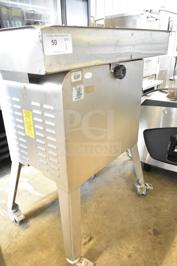 Sirman TC 32 MONTANA E commercial meat grinder, stainless steel, 220V, 3 phase, floor style. Visible labels show model and specs.