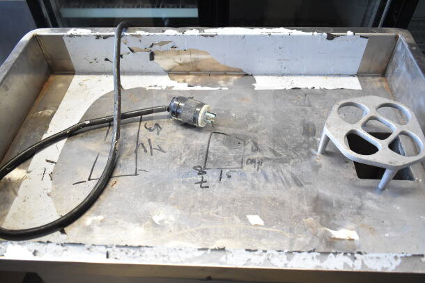 Sirman TC 32 MONTANA E meat grinder, electric, commercial floor style, 220V, 3 phase; worn surface with cord and metal plate.