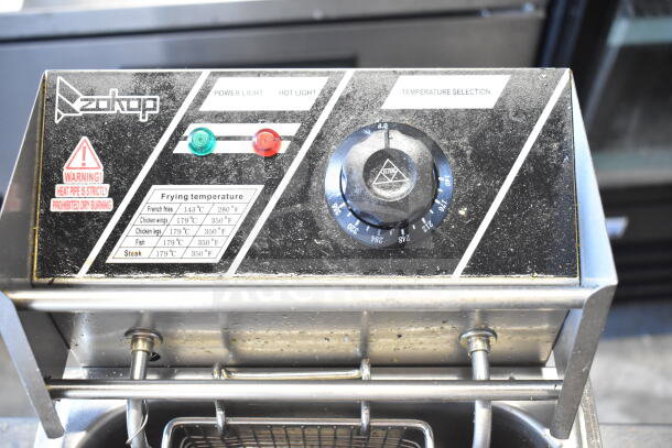 EH81 countertop electric deep fat fryer with fry basket and lid, 110 volts, 1 phase. Features temperature control.