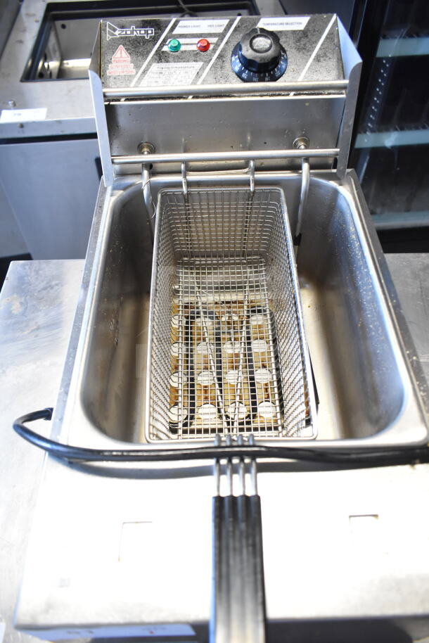 EH81 countertop electric deep fat fryer with basket and lid, 110V, 1-phase, model EH81, visible controls and dials.