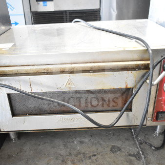 Avantco 177DPO18S countertop electric pizza oven with cooking stone, 120V, used condition, visible temperature controls.