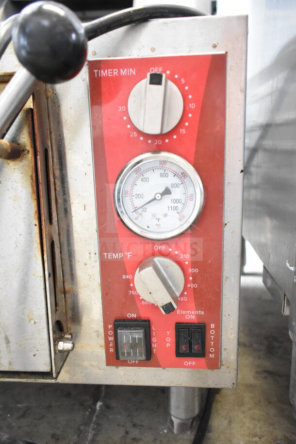Avantco 177DPO18S Commercial Pizza Oven controls with timer, temperature settings, and power switches. 120V, single deck.