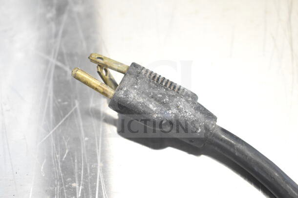 Close-up of the power plug for Avantco 177DPO18S Commercial Pizza Oven, showing a slightly worn condition.